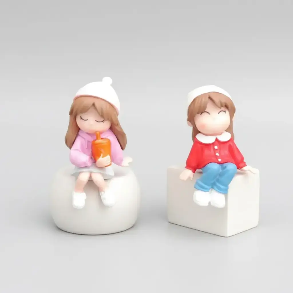 Miniature Cute Sitting Girls