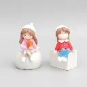 Miniature Cute Sitting Girls